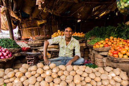 indian small entrepreuner selling fruits and vegetables